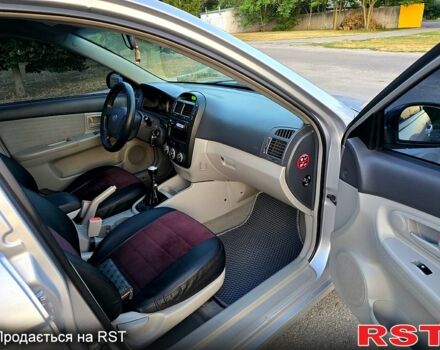 Сірий Кіа Черато, об'ємом двигуна 1.6 л та пробігом 309 тис. км за 4350 $, фото 8 на Automoto.ua
