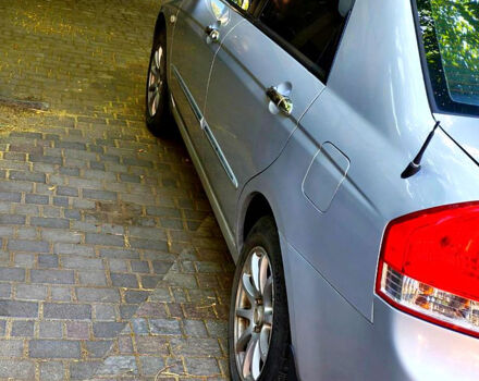 Серый Киа Черато, объемом двигателя 2 л и пробегом 186 тыс. км за 5800 $, фото 5 на Automoto.ua