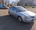Серый Киа Черато, объемом двигателя 1.59 л и пробегом 196 тыс. км за 4300 $, фото 1 на Automoto.ua