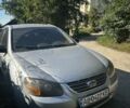 Серый Киа Черато, объемом двигателя 1.6 л и пробегом 350 тыс. км за 3200 $, фото 4 на Automoto.ua