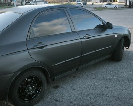 Серый Киа Черато, объемом двигателя 2 л и пробегом 310 тыс. км за 3200 $, фото 1 на Automoto.ua