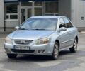 Серый Киа Черато, объемом двигателя 2 л и пробегом 237 тыс. км за 3017 $, фото 1 на Automoto.ua
