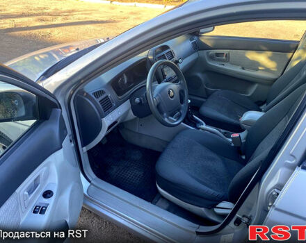 Серый Киа Черато, объемом двигателя 1.6 л и пробегом 228 тыс. км за 4300 $, фото 4 на Automoto.ua