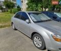 Серый Киа Черато, объемом двигателя 1.6 л и пробегом 210 тыс. км за 5200 $, фото 1 на Automoto.ua