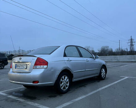 Серый Киа Черато, объемом двигателя 2 л и пробегом 326 тыс. км за 4200 $, фото 3 на Automoto.ua