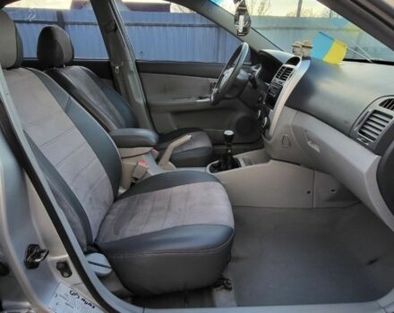 Серый Киа Черато, объемом двигателя 1.6 л и пробегом 326 тыс. км за 2700 $, фото 4 на Automoto.ua