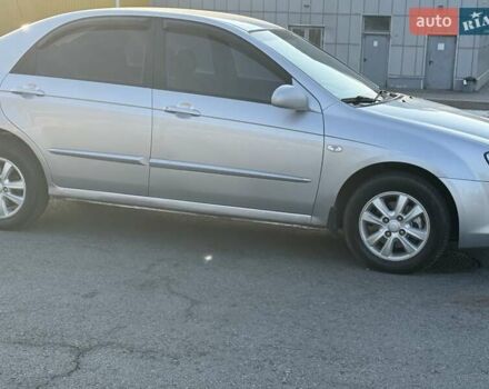 Серый Киа Черато, объемом двигателя 2 л и пробегом 202 тыс. км за 5200 $, фото 6 на Automoto.ua
