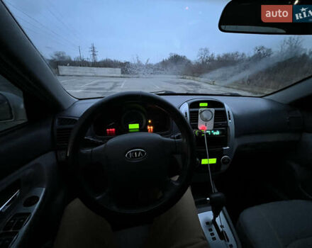 Серый Киа Черато, объемом двигателя 2 л и пробегом 326 тыс. км за 4200 $, фото 12 на Automoto.ua