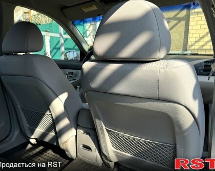 Сірий Кіа Черато, об'ємом двигуна 1.6 л та пробігом 188 тис. км за 5200 $, фото 9 на Automoto.ua