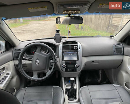 Серый Киа Черато, объемом двигателя 1.6 л и пробегом 294 тыс. км за 4250 $, фото 7 на Automoto.ua