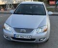 Серый Киа Черато, объемом двигателя 2 л и пробегом 202 тыс. км за 5200 $, фото 1 на Automoto.ua