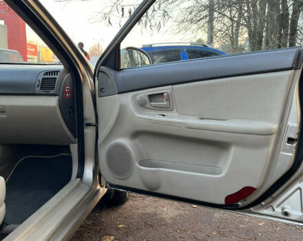 Серый Киа Черато, объемом двигателя 1.6 л и пробегом 268 тыс. км за 3900 $, фото 5 на Automoto.ua