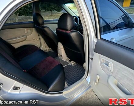 Сірий Кіа Черато, об'ємом двигуна 1.6 л та пробігом 309 тис. км за 4350 $, фото 9 на Automoto.ua