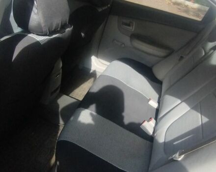 Серый Киа Черато, объемом двигателя 1.6 л и пробегом 296 тыс. км за 3900 $, фото 8 на Automoto.ua