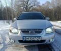 Серый Киа Черато, объемом двигателя 2 л и пробегом 240 тыс. км за 5600 $, фото 1 на Automoto.ua
