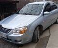 Серый Киа Черато, объемом двигателя 1.6 л и пробегом 200 тыс. км за 4950 $, фото 1 на Automoto.ua