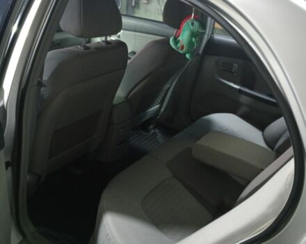 Серый Киа Черато, объемом двигателя 2 л и пробегом 165 тыс. км за 4600 $, фото 3 на Automoto.ua