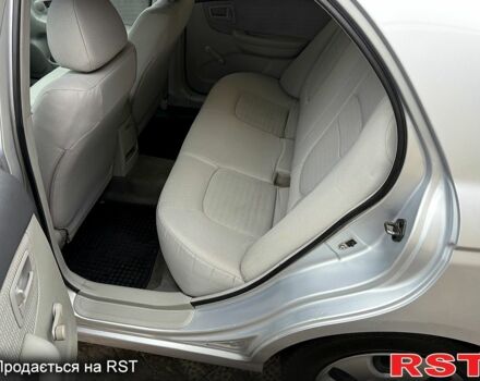 Серый Киа Черато, объемом двигателя 1.6 л и пробегом 250 тыс. км за 4200 $, фото 11 на Automoto.ua