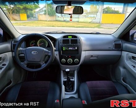 Сірий Кіа Черато, об'ємом двигуна 1.6 л та пробігом 309 тис. км за 4350 $, фото 7 на Automoto.ua