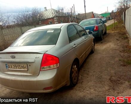 Серый Киа Черато, объемом двигателя 2 л и пробегом 230 тыс. км за 3400 $, фото 1 на Automoto.ua