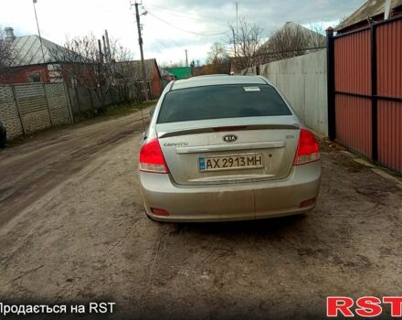 Серый Киа Черато, объемом двигателя 2 л и пробегом 230 тыс. км за 3400 $, фото 2 на Automoto.ua