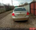 Серый Киа Черато, объемом двигателя 2 л и пробегом 230 тыс. км за 3400 $, фото 2 на Automoto.ua