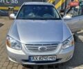 Серый Киа Черато, объемом двигателя 2 л и пробегом 268 тыс. км за 3700 $, фото 1 на Automoto.ua