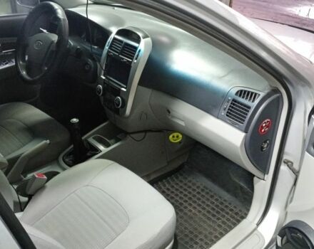 Серый Киа Черато, объемом двигателя 2 л и пробегом 165 тыс. км за 4600 $, фото 4 на Automoto.ua