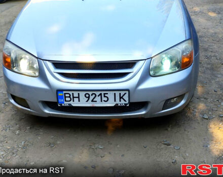 Серый Киа Черато, объемом двигателя 2 л и пробегом 186 тыс. км за 5800 $, фото 1 на Automoto.ua