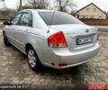 Серый Киа Черато, объемом двигателя 1.6 л и пробегом 250 тыс. км за 4200 $, фото 5 на Automoto.ua