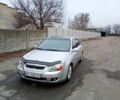 Серый Киа Черато, объемом двигателя 2 л и пробегом 165 тыс. км за 4600 $, фото 1 на Automoto.ua
