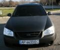 Сірий Кіа Черато, об'ємом двигуна 2 л та пробігом 310 тис. км за 4700 $, фото 1 на Automoto.ua