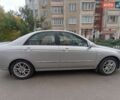 Серый Киа Черато, объемом двигателя 2 л и пробегом 127 тыс. км за 4500 $, фото 1 на Automoto.ua