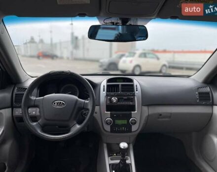 Серый Киа Черато, объемом двигателя 2 л и пробегом 183 тыс. км за 4000 $, фото 27 на Automoto.ua
