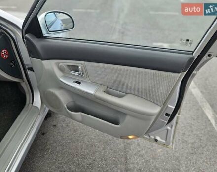 Сірий Кіа Черато, об'ємом двигуна 1.6 л та пробігом 202 тис. км за 4100 $, фото 14 на Automoto.ua