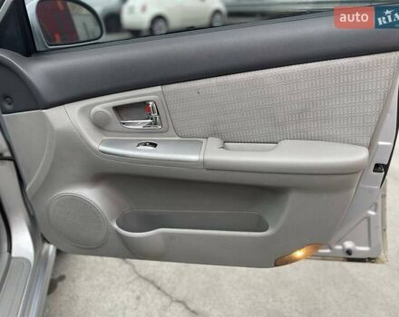 Серый Киа Черато, объемом двигателя 2 л и пробегом 183 тыс. км за 4000 $, фото 20 на Automoto.ua