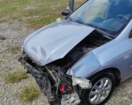 Сірий Кіа Черато, об'ємом двигуна 1.59 л та пробігом 203 тис. км за 1800 $, фото 5 на Automoto.ua