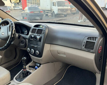 Серый Киа Черато, объемом двигателя 1.6 л и пробегом 268 тыс. км за 3900 $, фото 7 на Automoto.ua