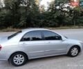 Серый Киа Черато, объемом двигателя 2 л и пробегом 164 тыс. км за 4900 $, фото 7 на Automoto.ua