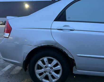 Серый Киа Черато, объемом двигателя 2 л и пробегом 326 тыс. км за 4200 $, фото 4 на Automoto.ua