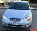 Серый Киа Черато, объемом двигателя 2 л и пробегом 202 тыс. км за 5200 $, фото 1 на Automoto.ua