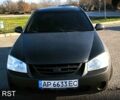 Сірий Кіа Черато, об'ємом двигуна 2 л та пробігом 310 тис. км за 4700 $, фото 1 на Automoto.ua