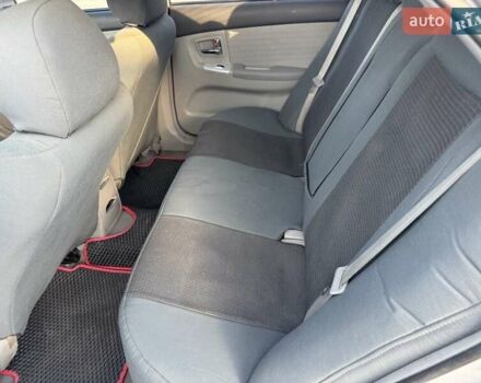 Сірий Кіа Черато, об'ємом двигуна 2 л та пробігом 202 тис. км за 4600 $, фото 37 на Automoto.ua