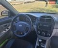 Серый Киа Черато, объемом двигателя 1.6 л и пробегом 312 тыс. км за 3999 $, фото 5 на Automoto.ua