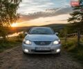 Серый Киа Черато, объемом двигателя 2 л и пробегом 350 тыс. км за 3777 $, фото 1 на Automoto.ua