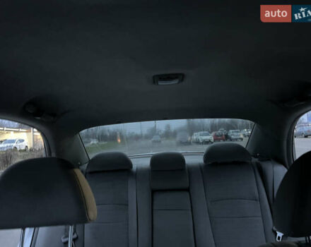 Серый Киа Черато, объемом двигателя 2 л и пробегом 326 тыс. км за 4200 $, фото 10 на Automoto.ua