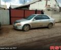 Серый Киа Черато, объемом двигателя 2 л и пробегом 230 тыс. км за 3400 $, фото 3 на Automoto.ua