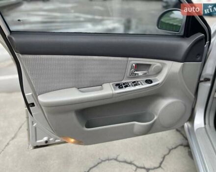 Серый Киа Черато, объемом двигателя 2 л и пробегом 183 тыс. км за 4000 $, фото 12 на Automoto.ua