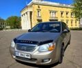 Серый Киа Черато, объемом двигателя 1.6 л и пробегом 186 тыс. км за 3800 $, фото 1 на Automoto.ua