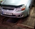 Серый Киа Черато, объемом двигателя 2 л и пробегом 165 тыс. км за 4600 $, фото 1 на Automoto.ua